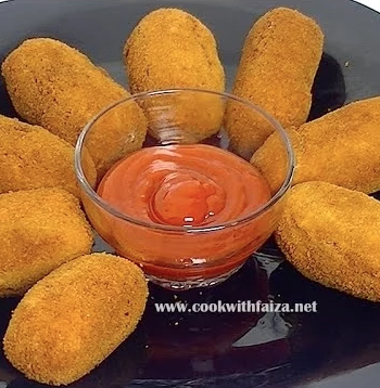 Golden crispy Pakistani-style Chicken Croquettes served with ketchup and green chutney, a perfect tea-time snack or Iftar recipe.