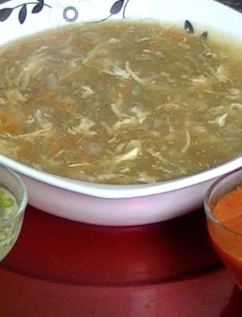 in a bowl Hot and Sour Soup Pakistani Style served with chili sauce – Cook With Faiza