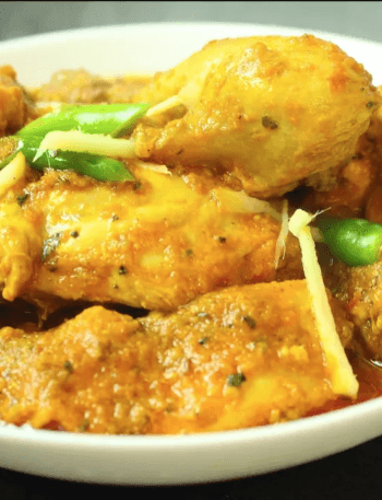 Authentic Peshawari Masala Murgh cooked with aromatic spices, served hot with naan and garnished with fresh coriander.
