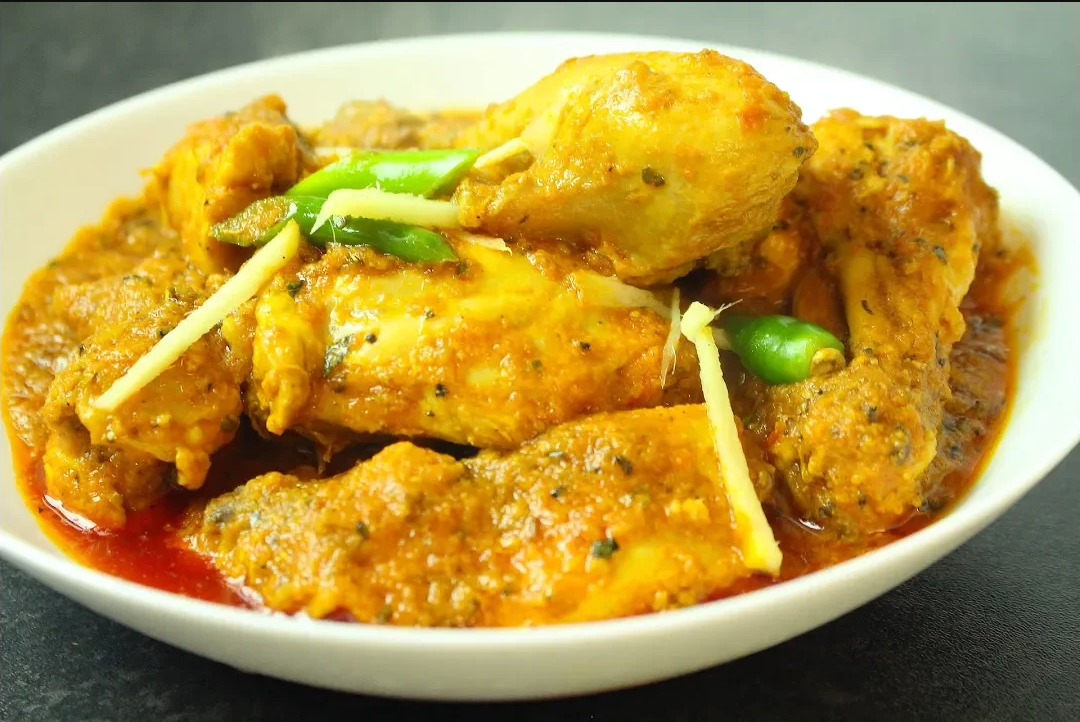 Authentic Peshawari Masala Murgh cooked with aromatic spices, served hot with naan and garnished with fresh coriander.