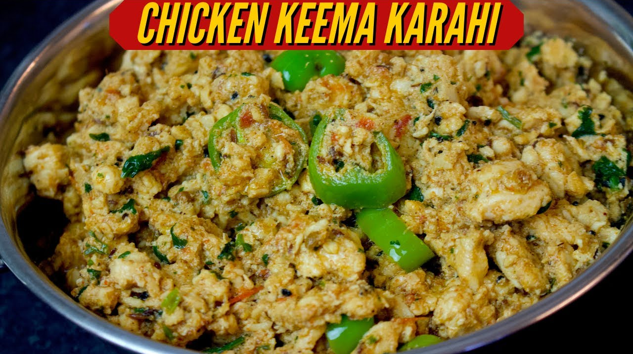 Delicious and spicy Chicken Keema Karahi garnished with fresh coriander and green chilies, served in a traditional karahi.