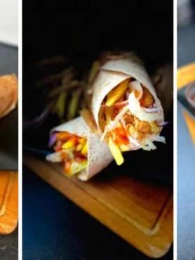 Spicy chicken wrap filled with grilled chicken, garlic sauce, fries, and fresh veggies