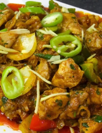Special Ginger Chicken served with naan – spicy Pakistani chicken curry with ginger and green chilies